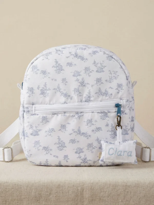 mochila infantil impermeable azul toile de jouy personalizada para guardería con nombre Clara